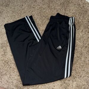 Adidas Black Track Pants with Iconic Stripes